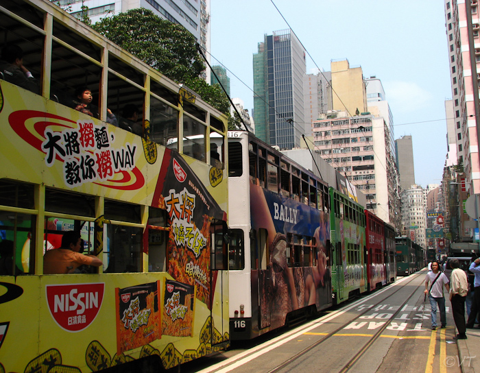 Trams in file door Hong Kong